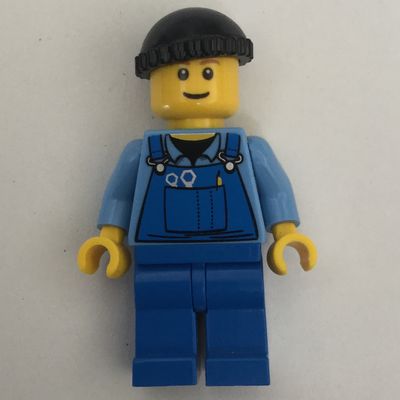 Man, Blue Overalls over Shirt, Blue Legs, Black Hat, Reddish Brown Eyebrows
