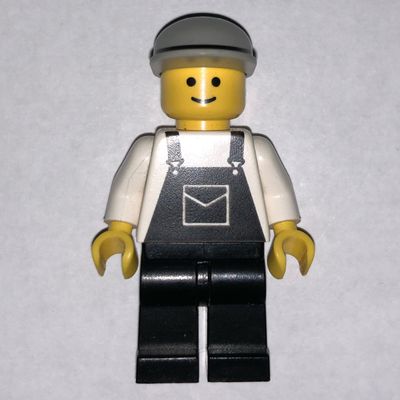 Man, Black Overalls, Light Gray Cap